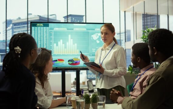 group-business-associates-discussing-project-development-plans-min