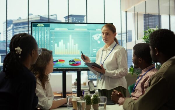 group-business-associates-discussing-project-development-plans-min